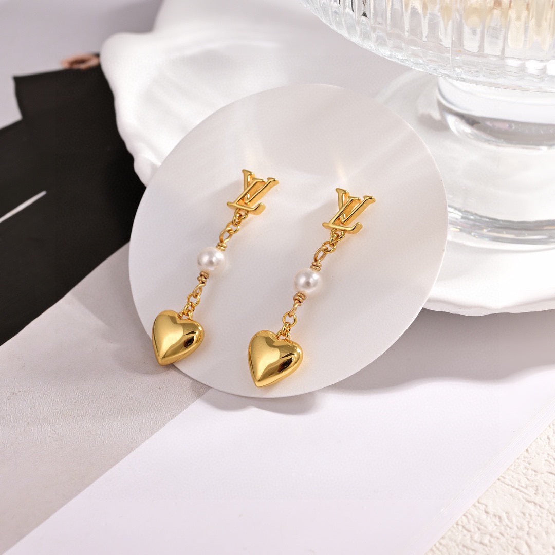 Martin Graham stud earrings in polished metal-tone – main product view