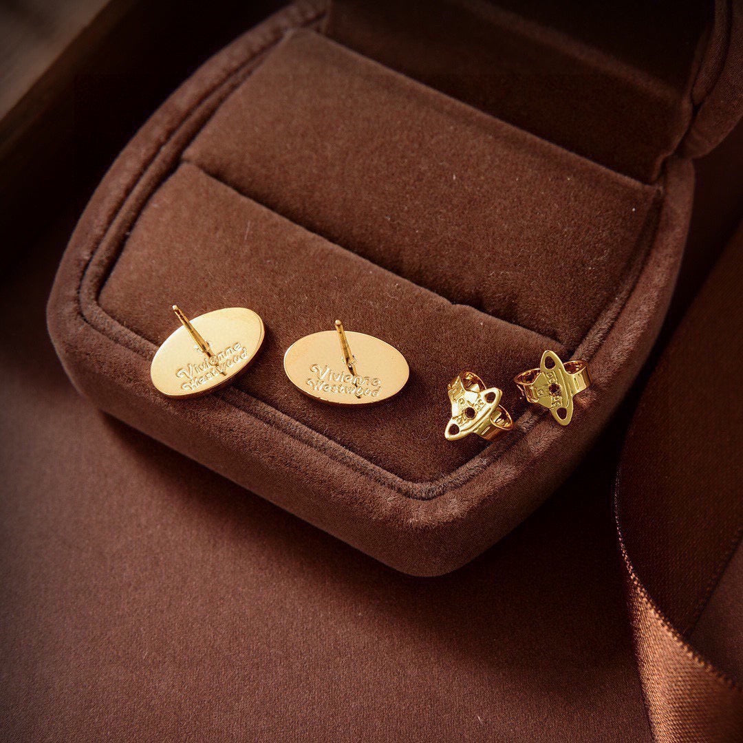 Martin Graham stud earrings in polished metal-tone – detail view