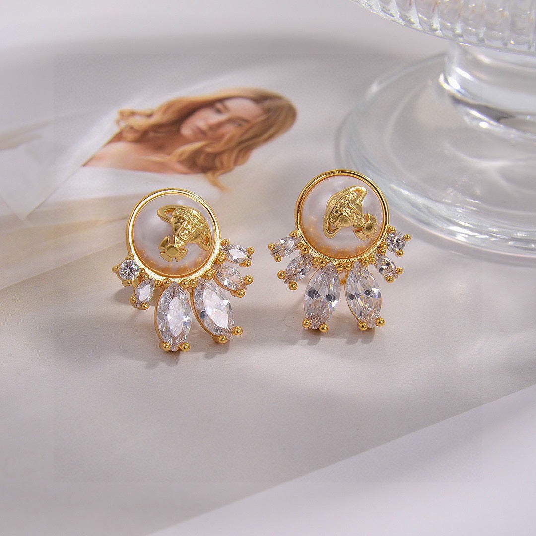 Martin Graham stud earrings in polished metal-tone – styled product view