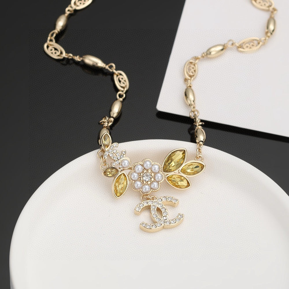 Martin Graham pendant necklace in polished metal-tone – front product view
