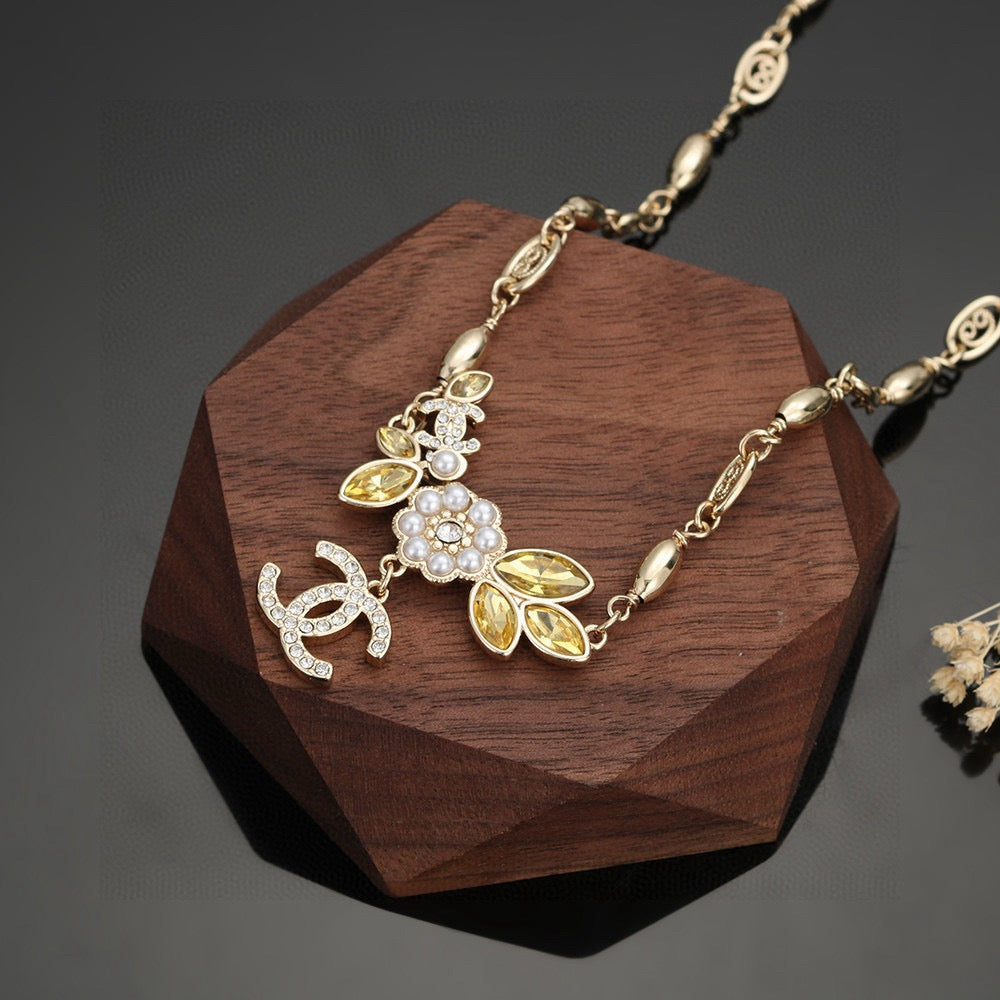 Martin Graham pendant necklace in polished metal-tone – detail view