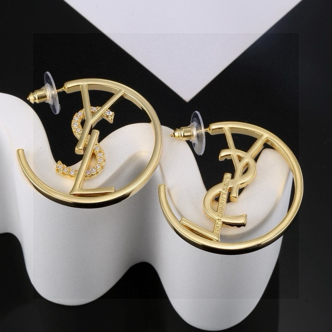 Martin Graham stud earrings in polished metal-tone – front product view