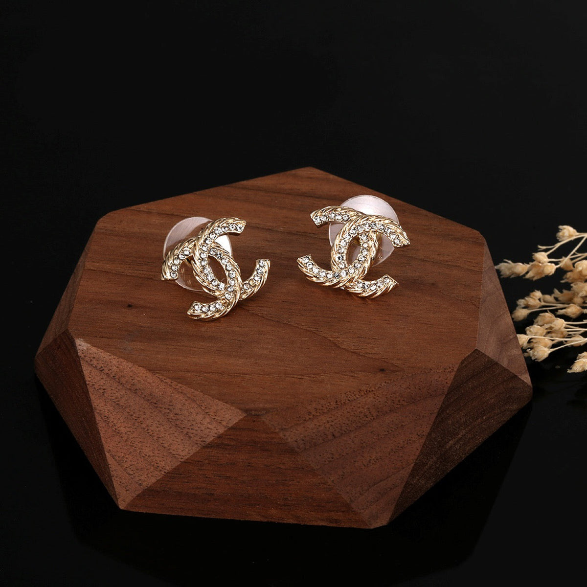 Martin Graham stud earrings in polished metal-tone – styled product view