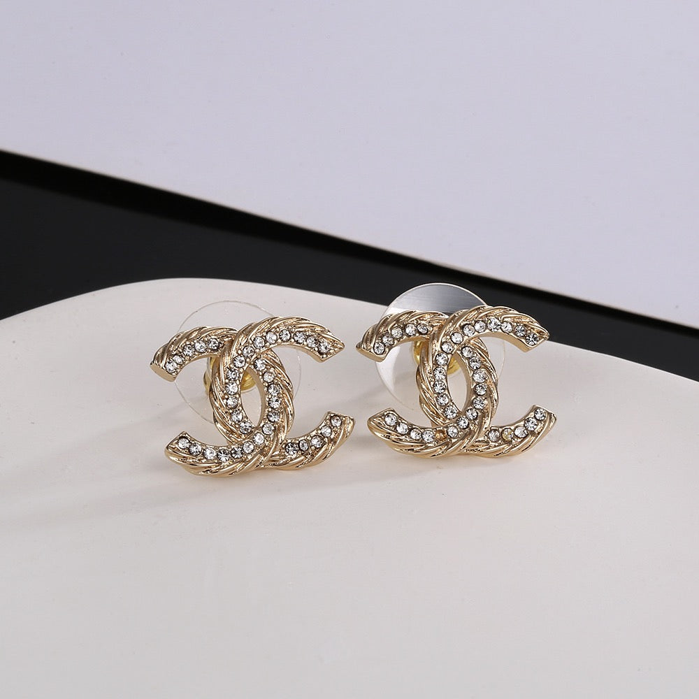 Martin Graham stud earrings in polished metal-tone – main product view