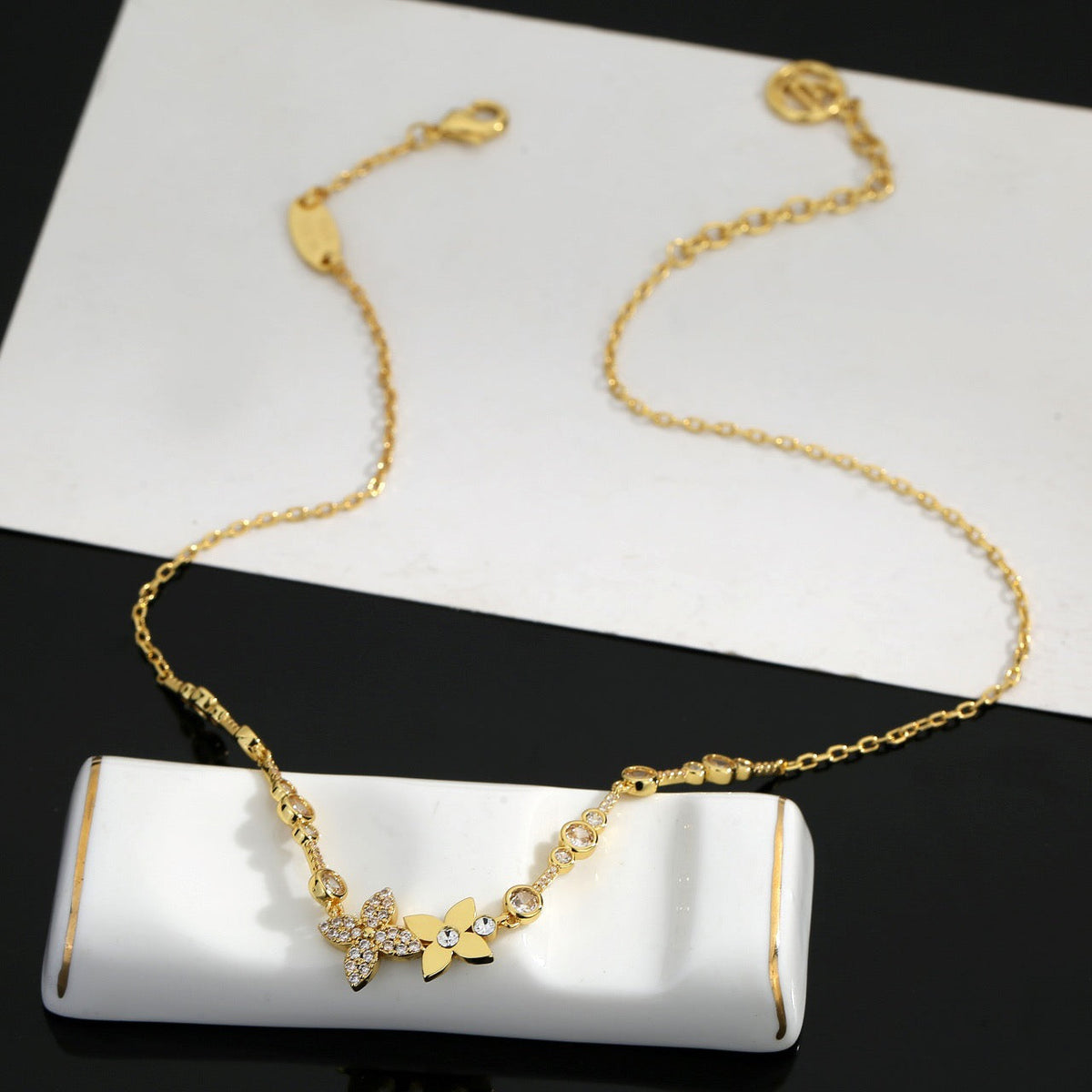 Martin Graham pendant necklace in polished metal-tone – front product view