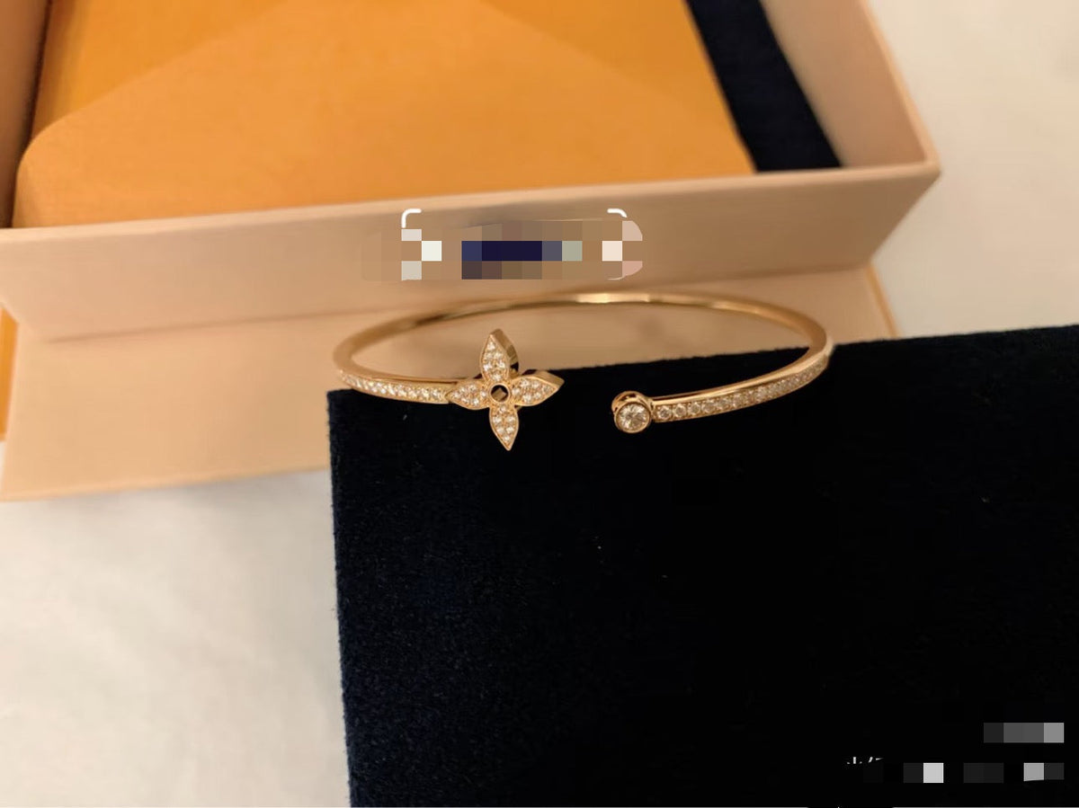 Martin Graham bangle in polished metal-tone – front product view