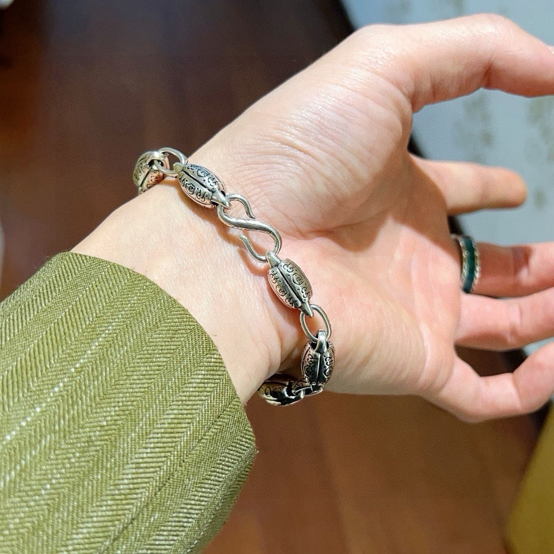 Martin Graham bracelet in polished metal-tone – side detail