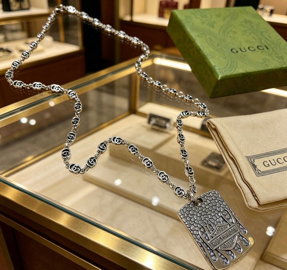 Martin Graham pendant necklace in polished metal-tone – front product view