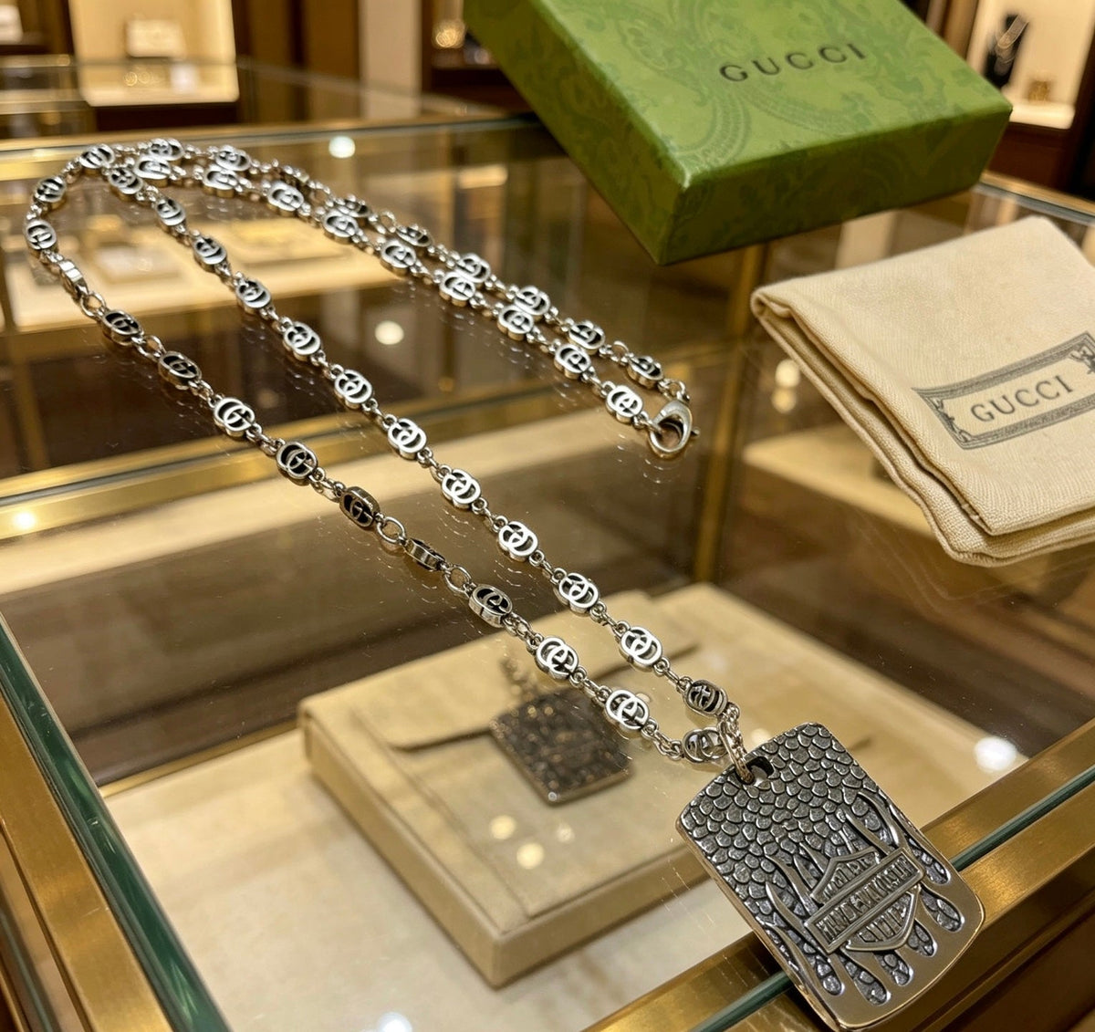 Martin Graham pendant necklace in polished metal-tone – front product view
