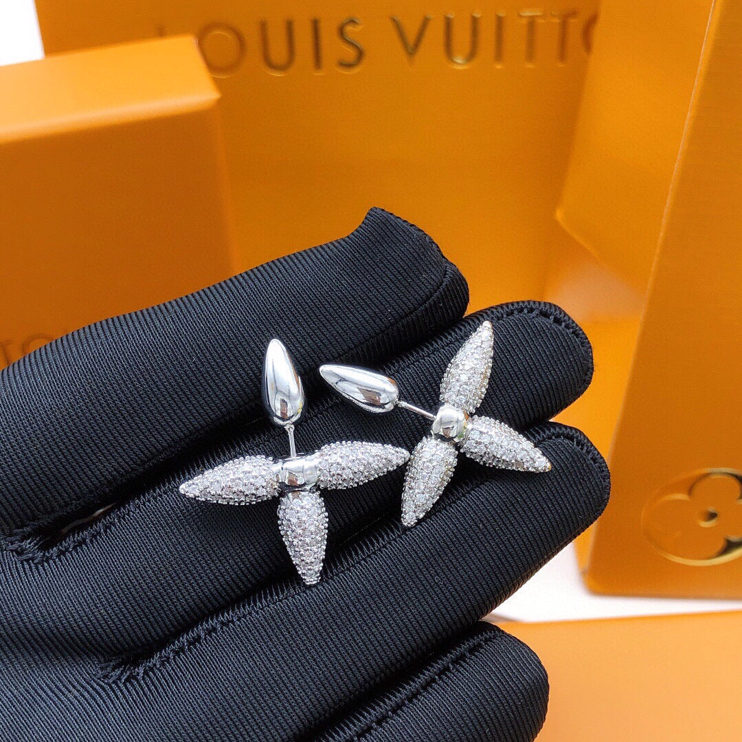 Martin Graham stud earrings in polished metal-tone – front product view