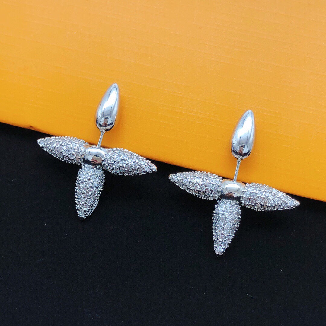 Martin Graham stud earrings in polished metal-tone – main product view