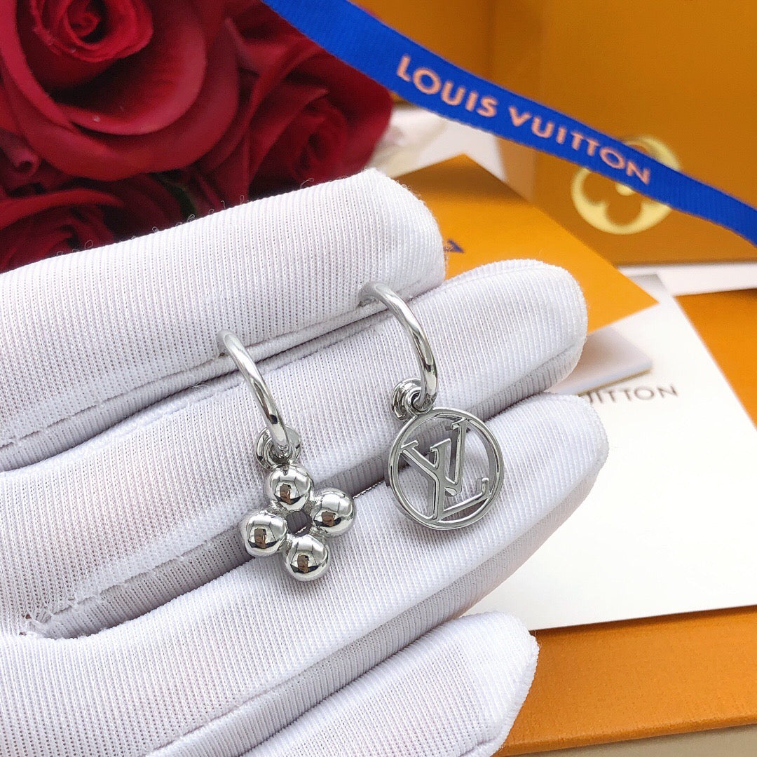 Martin Graham stud earrings in polished metal-tone – front product view