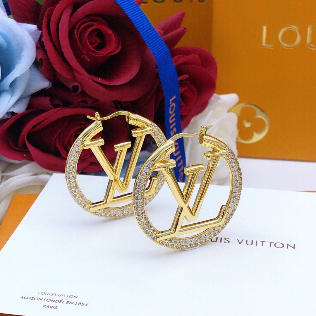 Martin Graham earrings in polished metal-tone – front product view