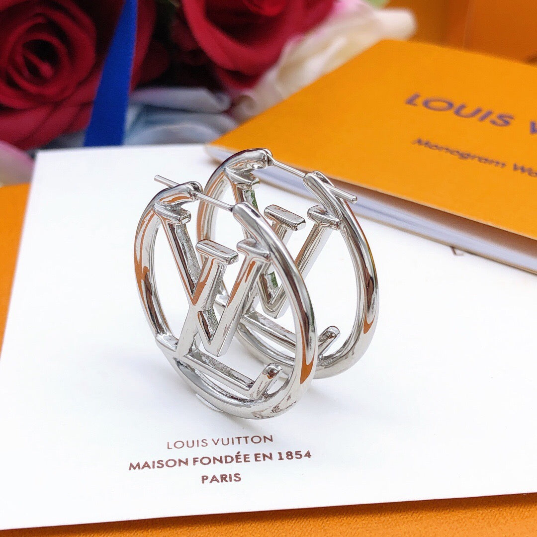Martin Graham earrings in polished metal-tone – front product view
