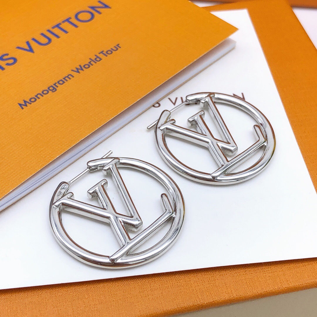 Martin Graham earrings in polished metal-tone – styled product view