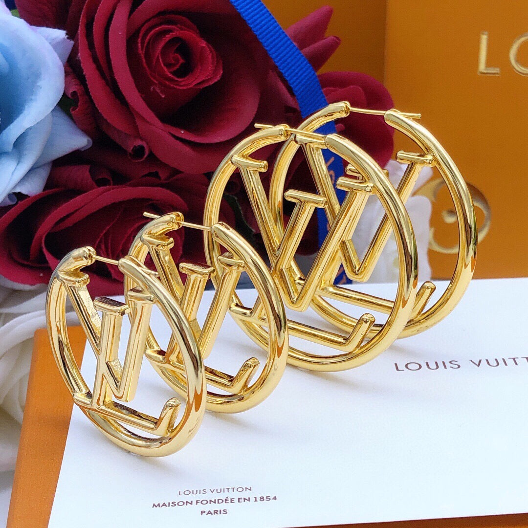 Martin Graham earrings in polished metal-tone – front product view