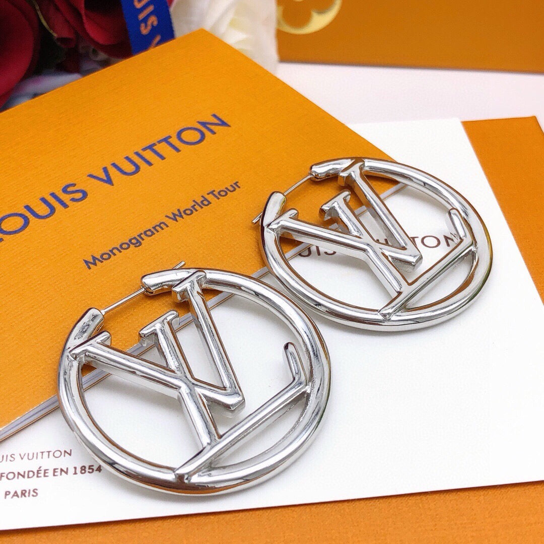 Martin Graham earrings in polished metal-tone – front product view