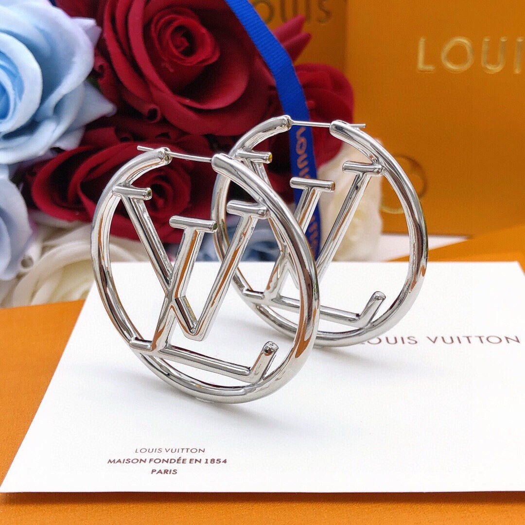 Martin Graham earrings in polished metal-tone – styled product view