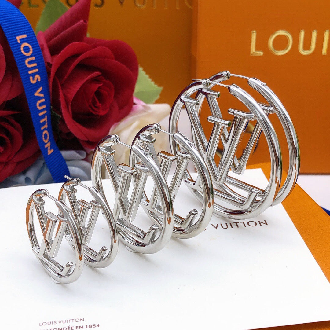 Martin Graham earrings in polished metal-tone – front product view