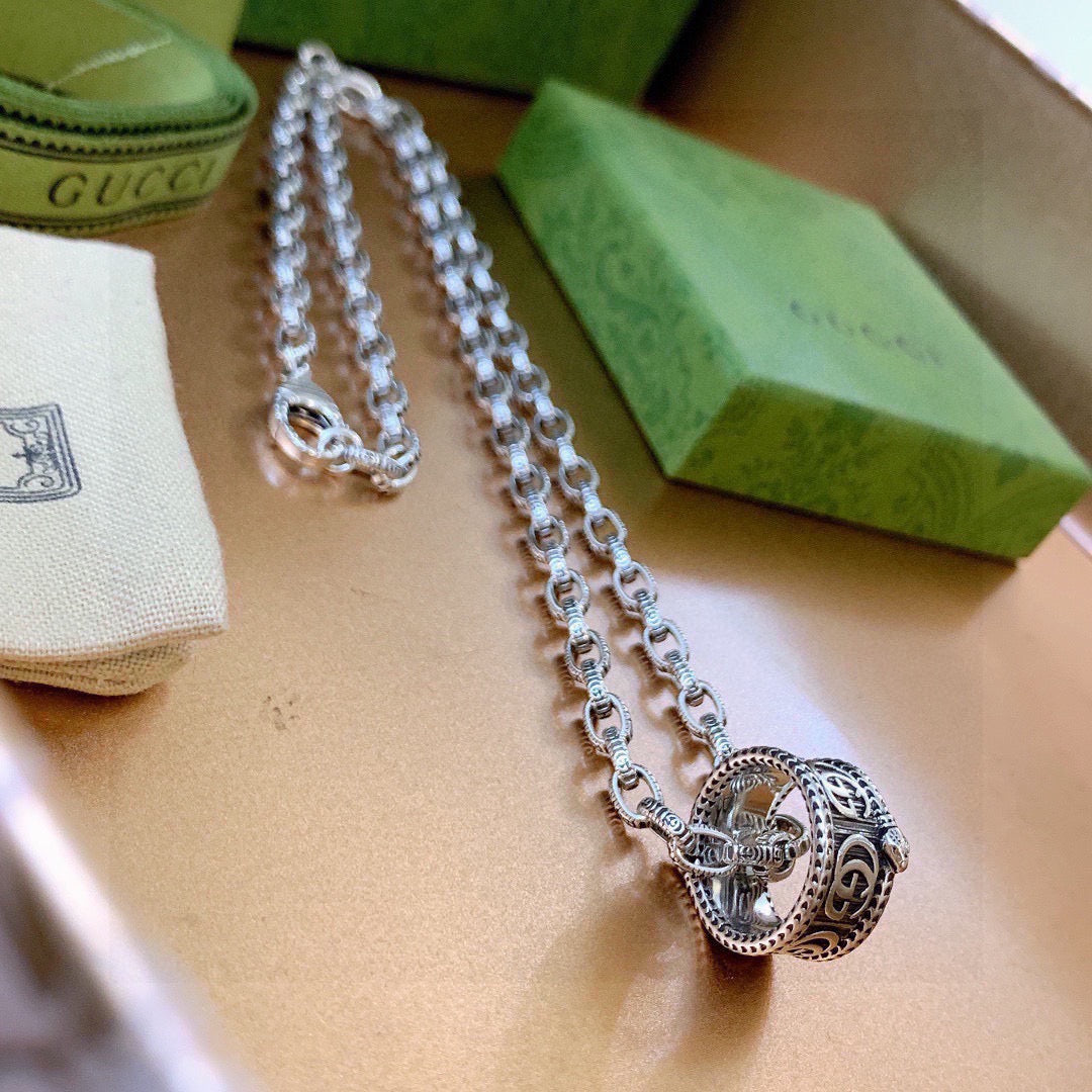 Martin Graham pendant necklace in polished metal-tone – front product view
