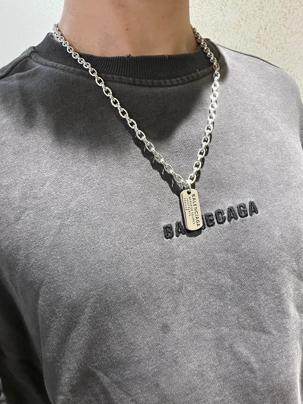 Martin Graham pendant necklace in polished metal-tone – detail view