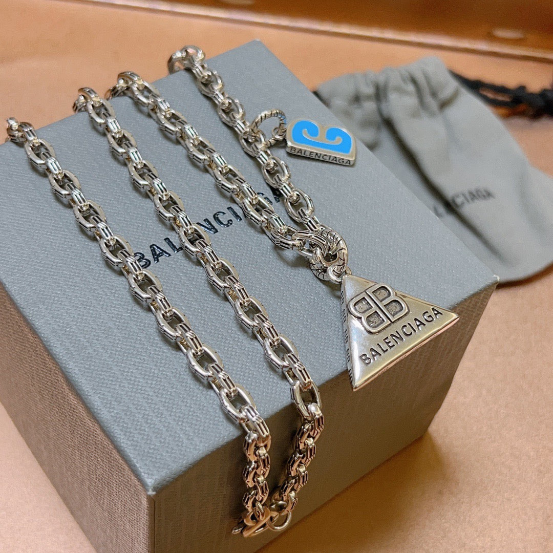 Martin Graham pendant necklace in polished metal-tone – close-up detail