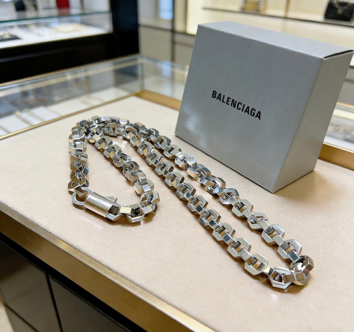 Martin Graham pendant necklace in polished metal-tone – close-up detail
