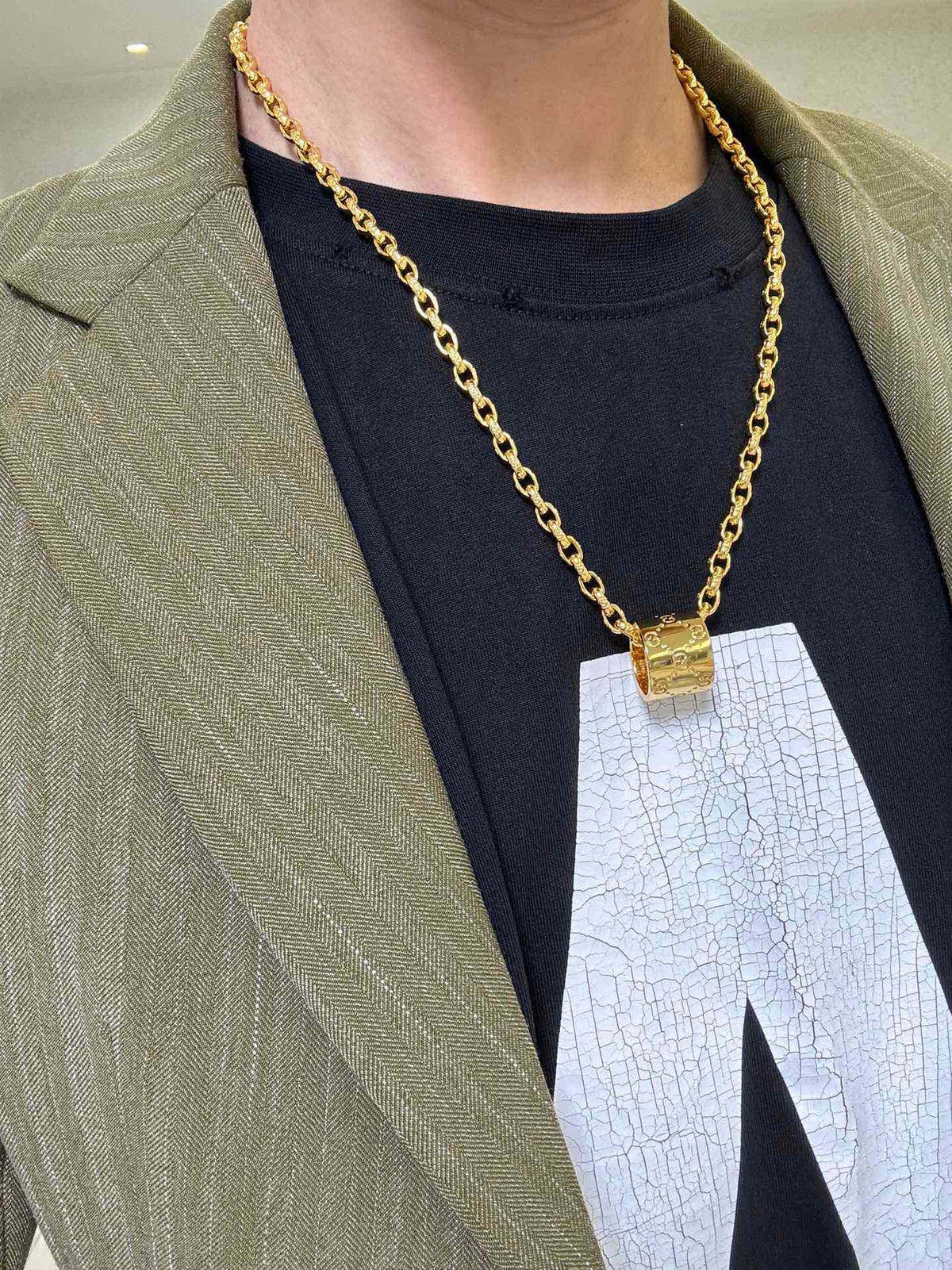Martin Graham pendant necklace in polished metal-tone – styled product view