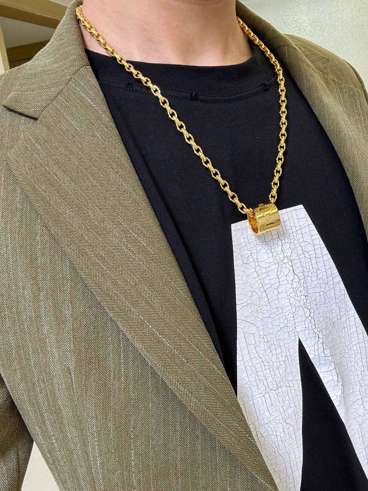 Martin Graham pendant necklace in polished metal-tone – front product view