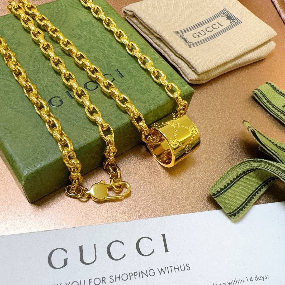 Martin Graham pendant necklace in polished metal-tone – detail view