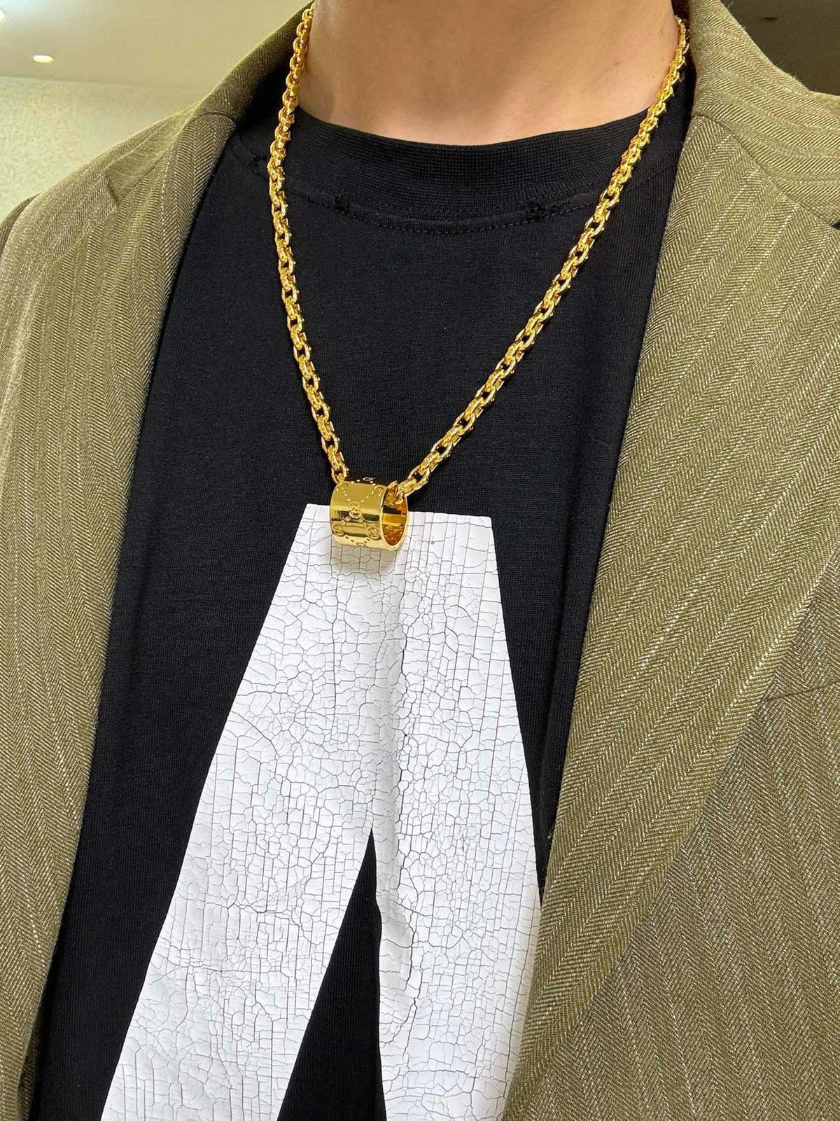 Martin Graham pendant necklace in polished metal-tone – detail view