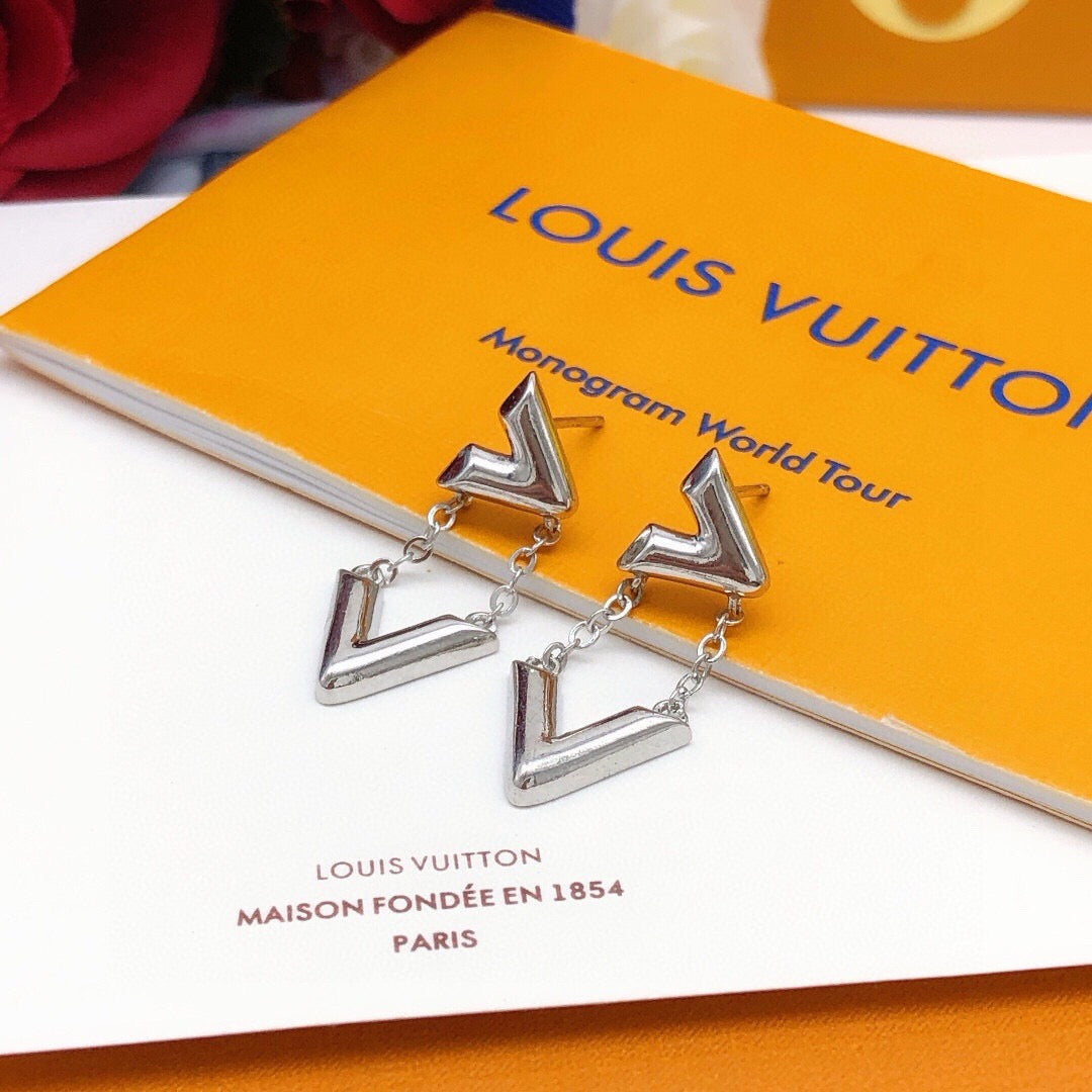 Martin Graham stud earrings in polished metal-tone – detail view