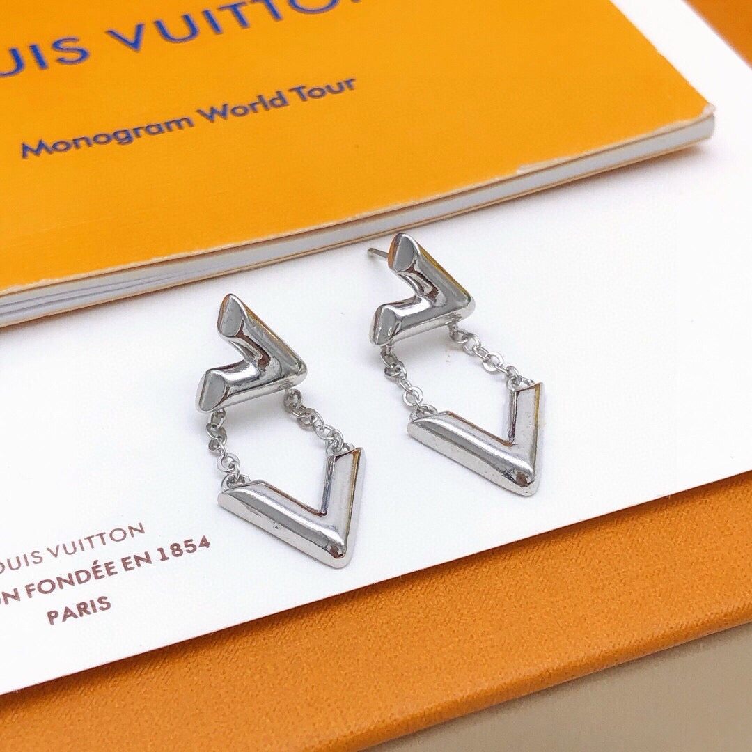 Martin Graham stud earrings in polished metal-tone – front product view