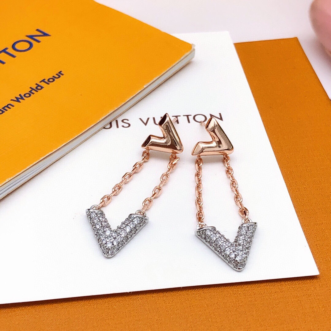Martin Graham stud earrings in polished metal-tone – detail view