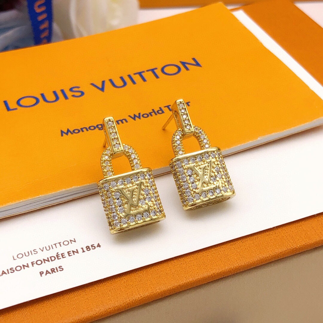Martin Graham stud earrings in polished metal-tone – front product view