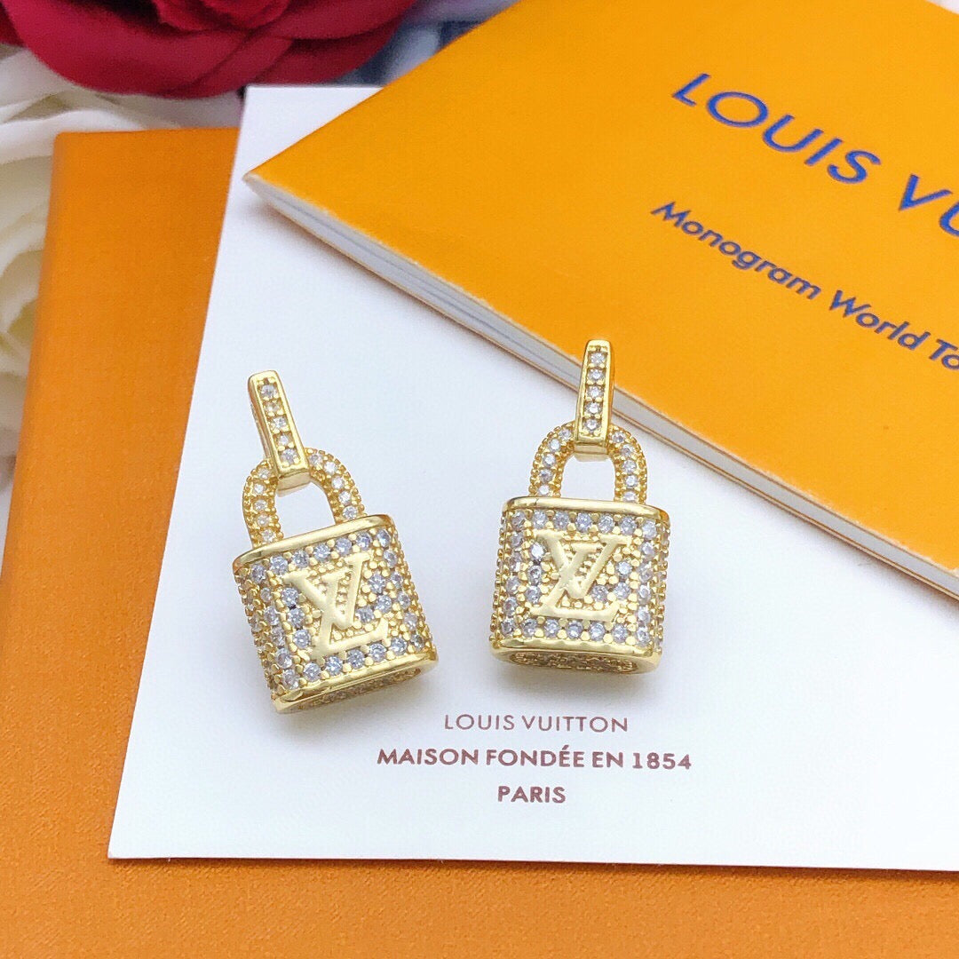 Martin Graham stud earrings in polished metal-tone – main product view