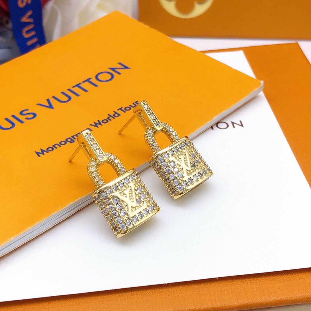 Martin Graham stud earrings in polished metal-tone – main product view