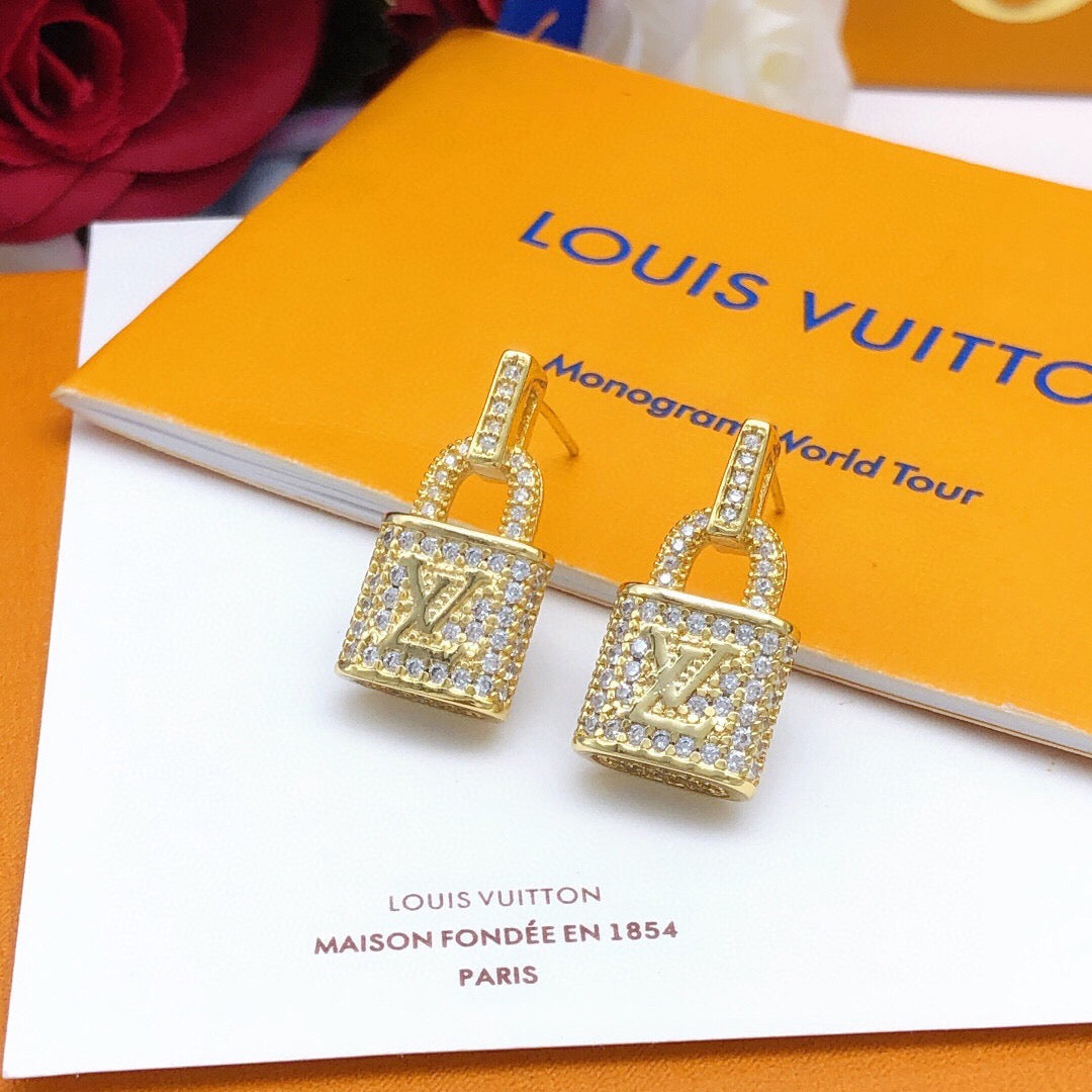 Martin Graham stud earrings in polished metal-tone – front product view