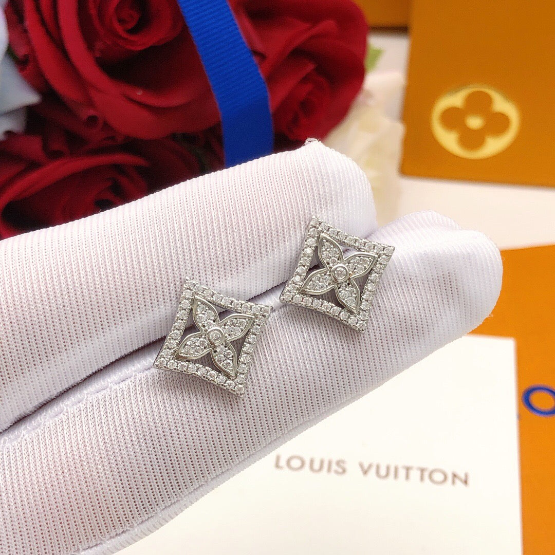 Martin Graham stud earrings in polished metal-tone – front product view