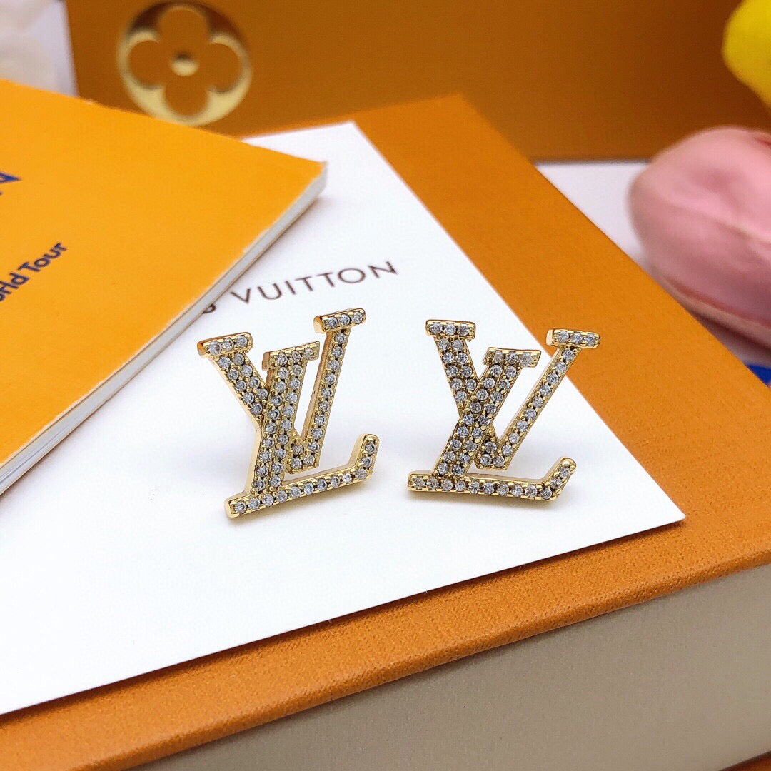 Martin Graham stud earrings in polished metal-tone – front product view