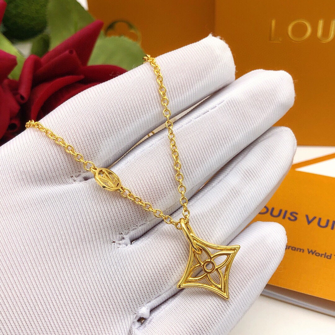 Martin Graham pendant necklace in polished metal-tone – close-up detail