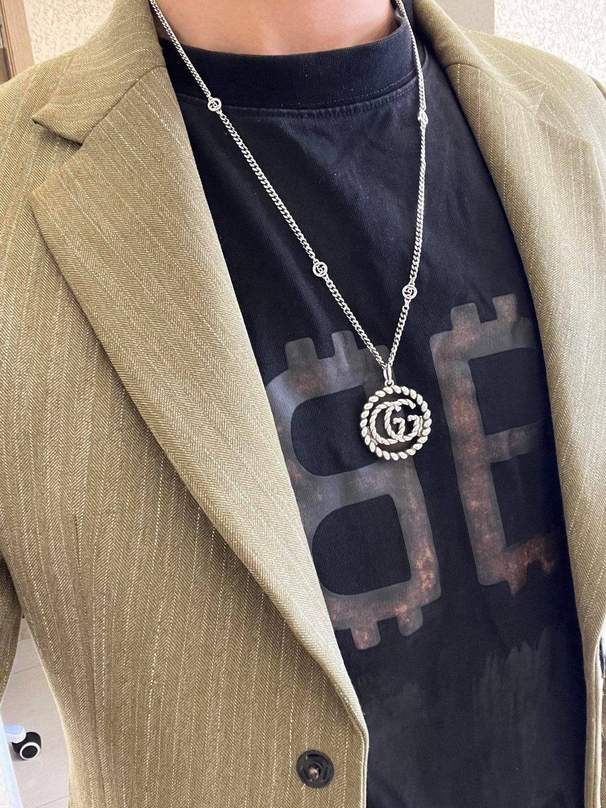 Martin Graham pendant necklace in polished metal-tone – detail view