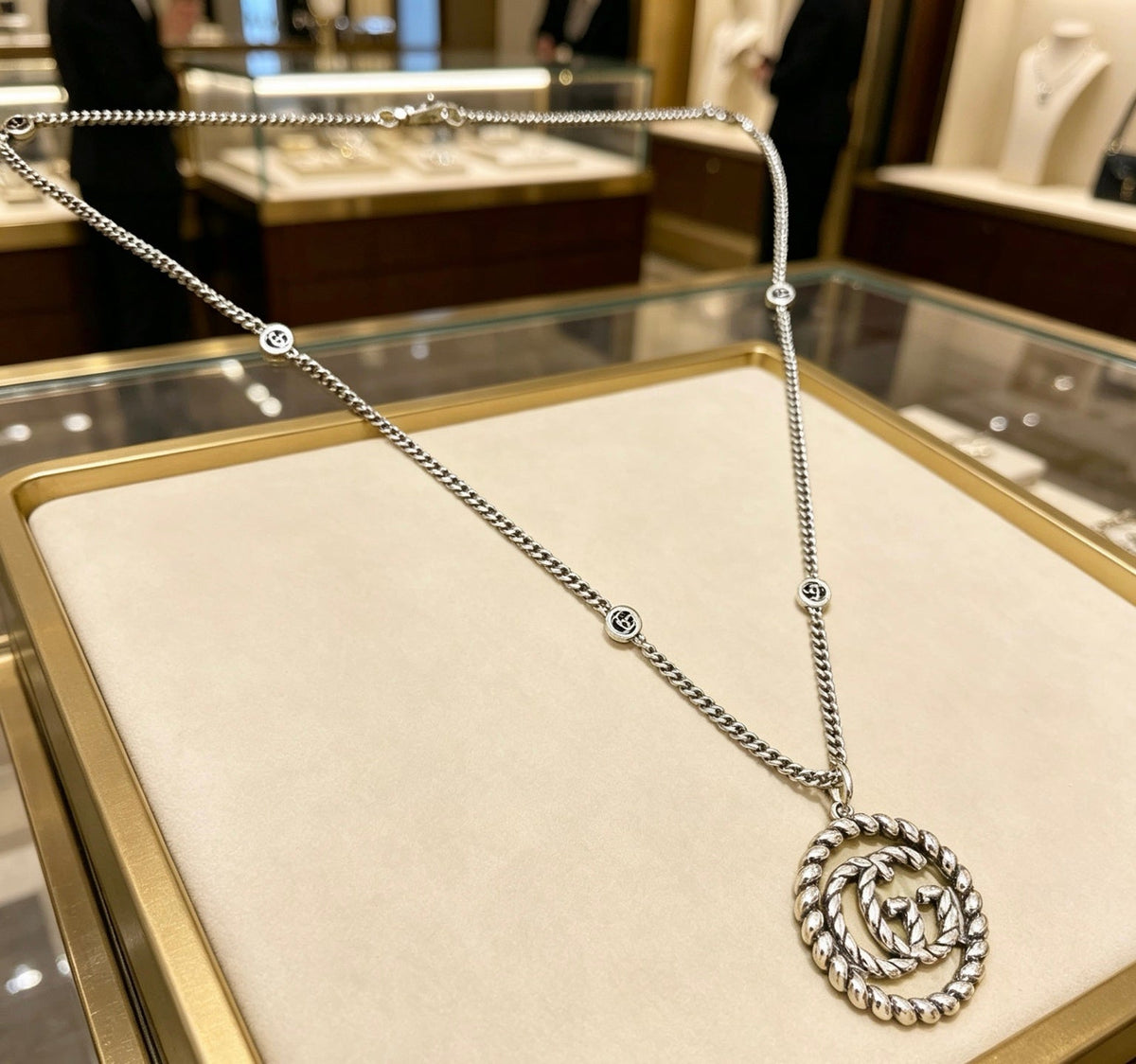 Martin Graham pendant necklace in polished metal-tone – front product view