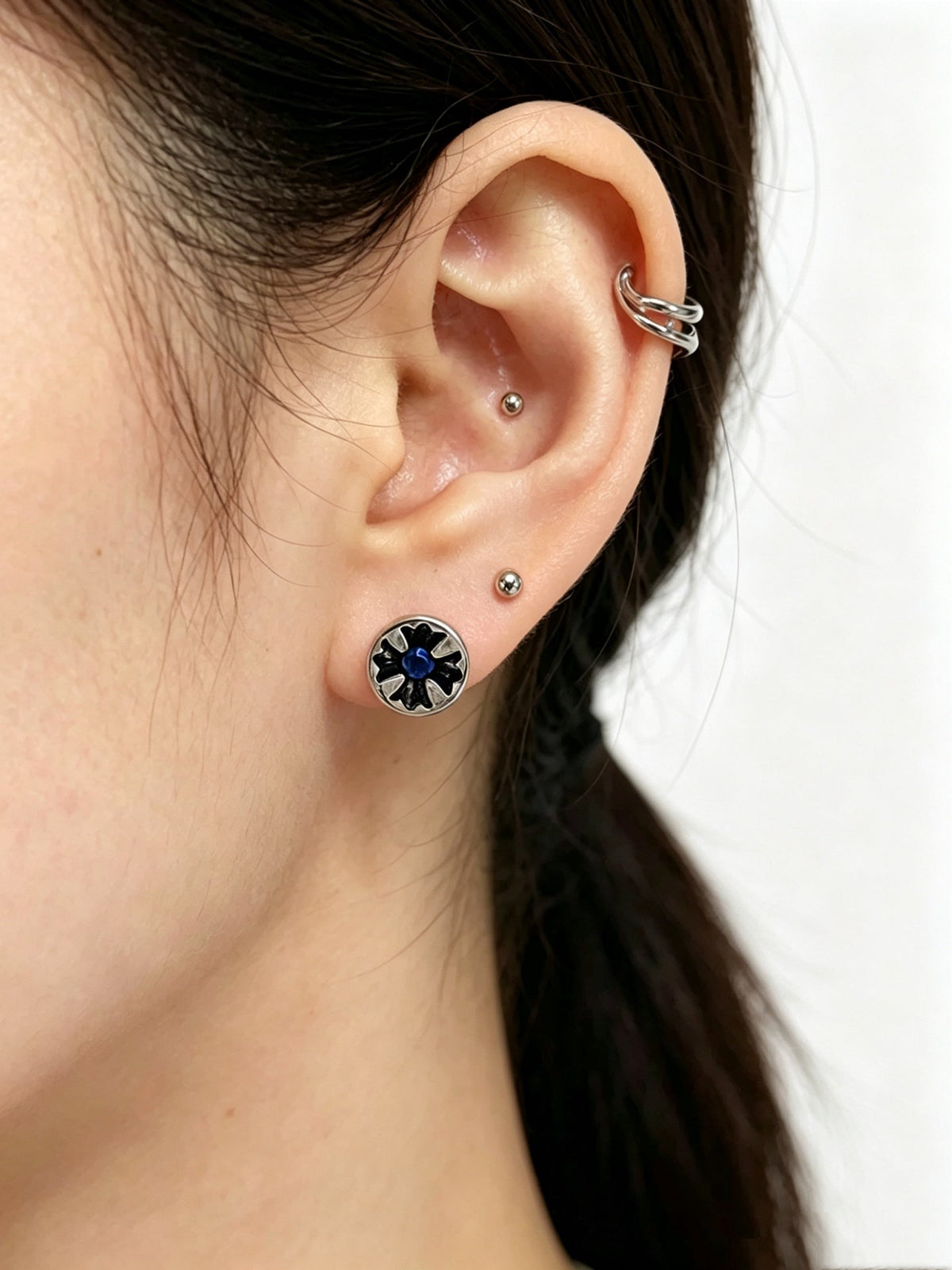 Martin Graham earrings in polished metal-tone – front product view