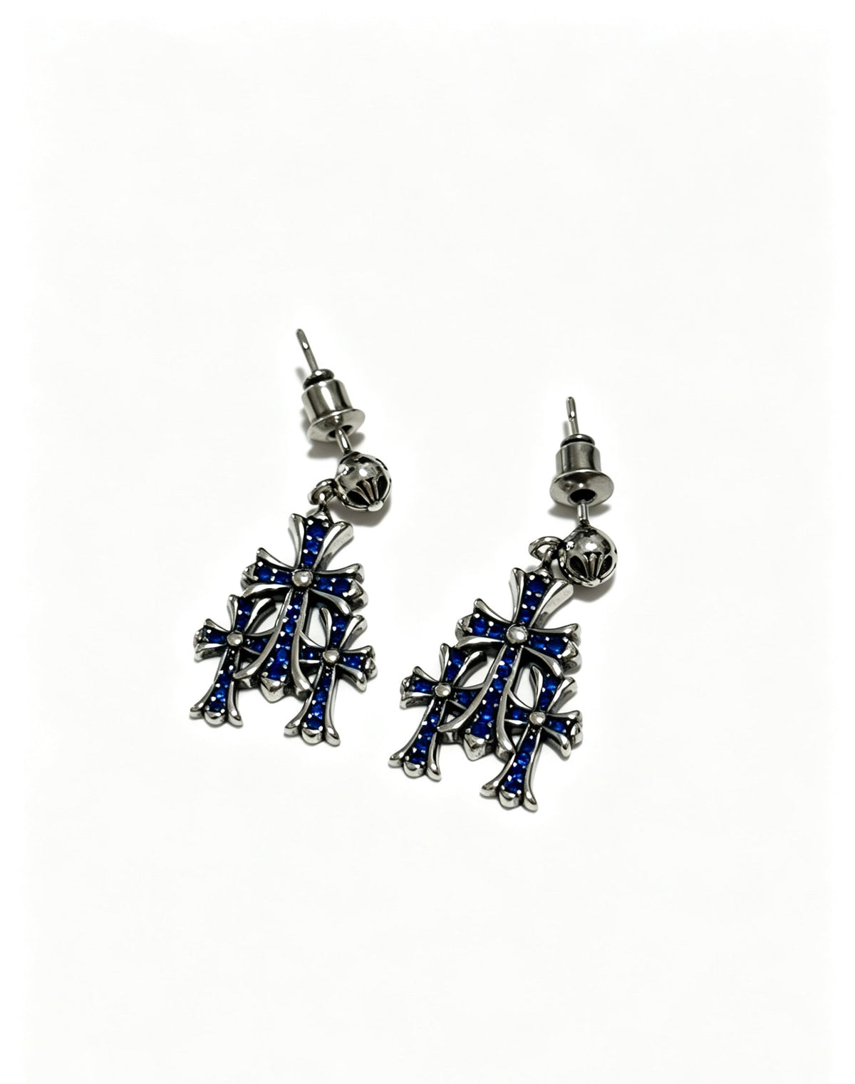 Martin Graham earrings in polished metal-tone – close-up detail