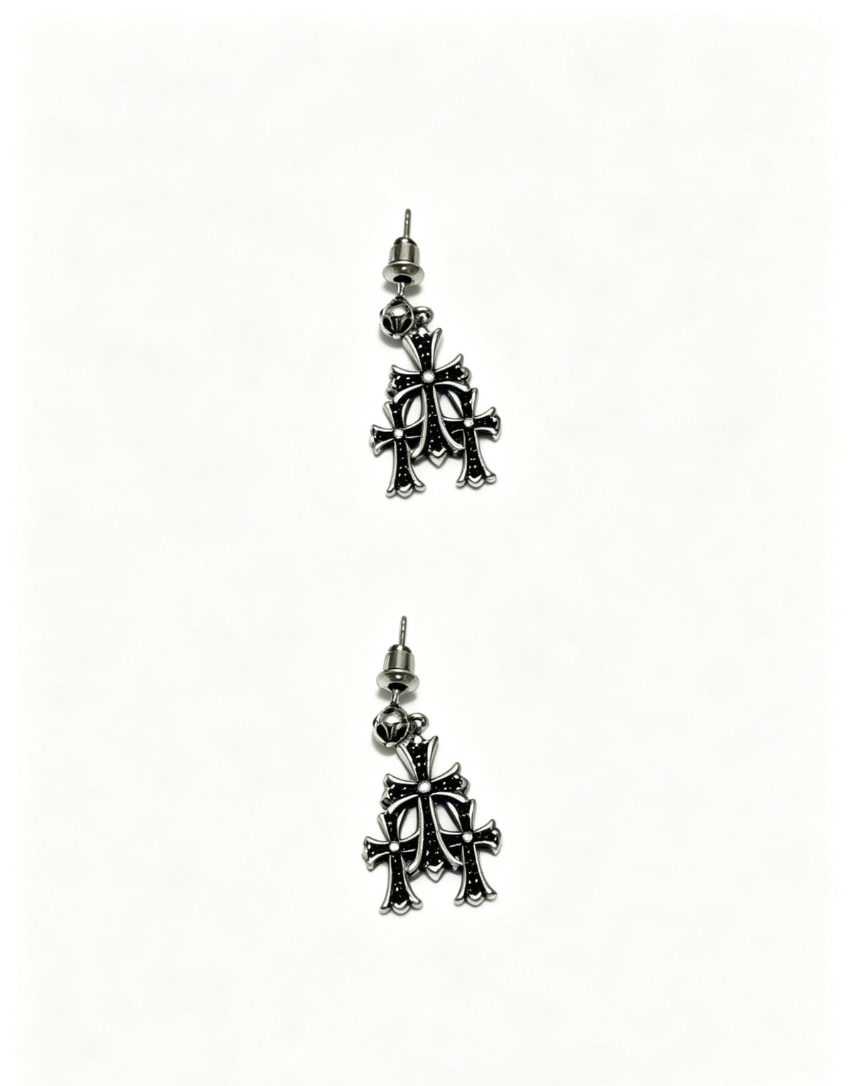 Martin Graham earrings in polished metal-tone – close-up detail