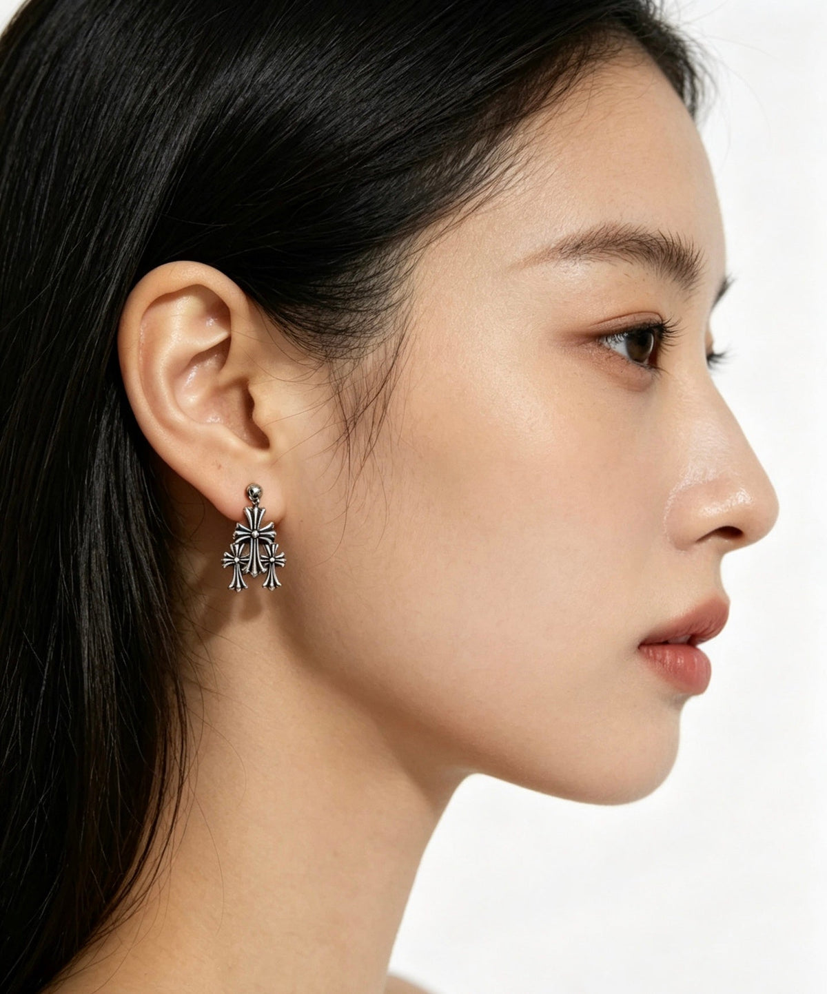 Martin Graham earrings in polished metal-tone – front product view