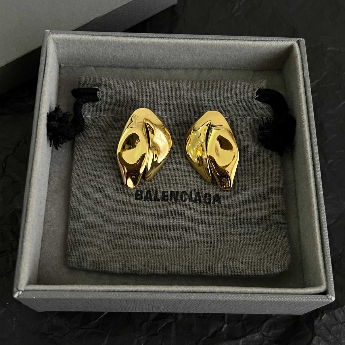 Martin Graham stud earrings in polished metal-tone – main product view
