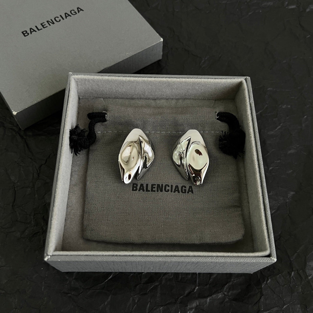 Martin Graham stud earrings in polished metal-tone – main product view
