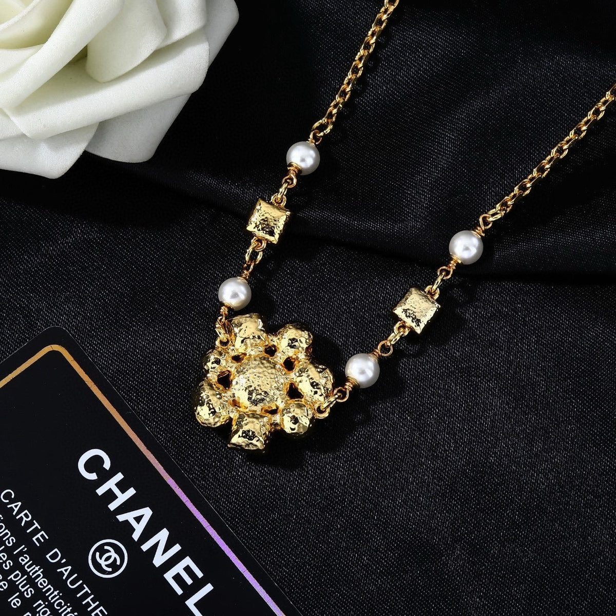 Martin Graham pendant necklace in polished metal-tone – close-up detail